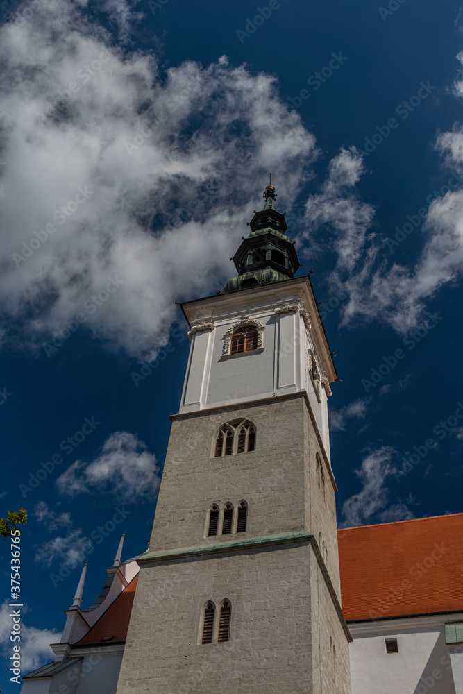 Old historic church and houses in Krems an der Donau in summer Austia
