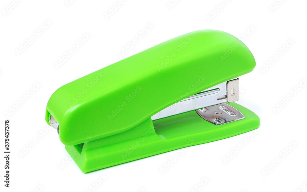Green stapler viewed from side isolated on white background Green stapler viewed from side isolated on white background