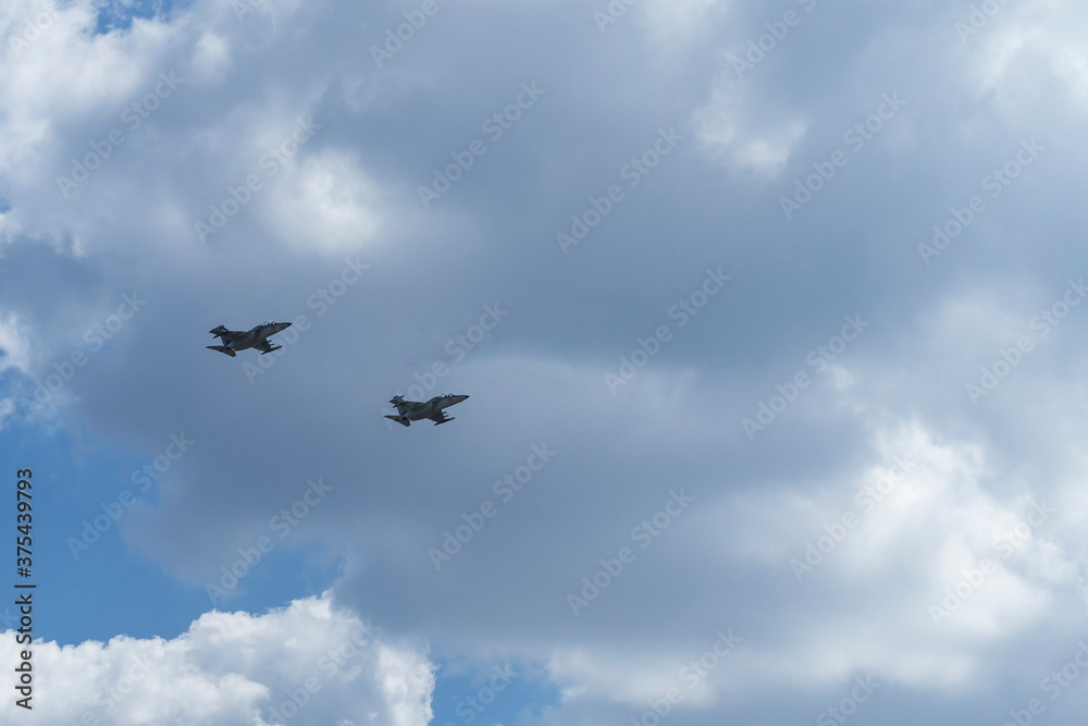 Daylight. combat vehicle aircraft in the amount of two pieces. blue sky. Daylight. combat vehicle aircraft in the amount of two pieces. blue sky.