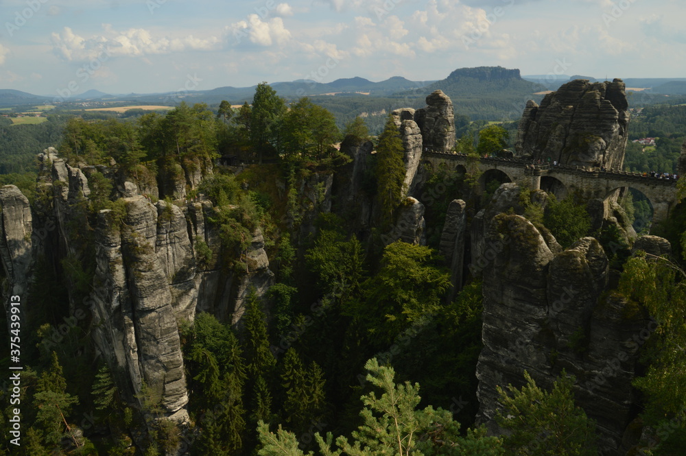 Fototapeta premium The stunning cliffs and riverside in the Saxon Bohemian Switzerland in Germany
