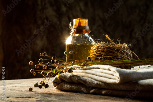 Flax products. Linseed oil, linen cloth, rope, and dry flax plants
