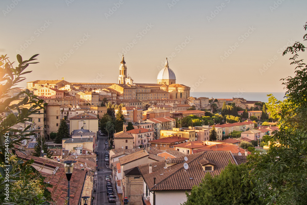 Loreto, Marche, province of Ancona. Panoramic view of the residence of the Basilica della Santa Casa, a popular pilgrimage site for Catholics at sunset.