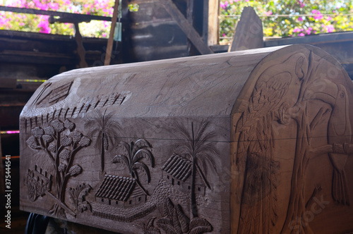 Treasure chest wood carving in progress in Sarchi workshop photo