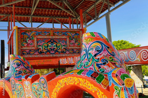 Bright colors of the worlds largest painted Oxcart in Sarchi Costa Rica