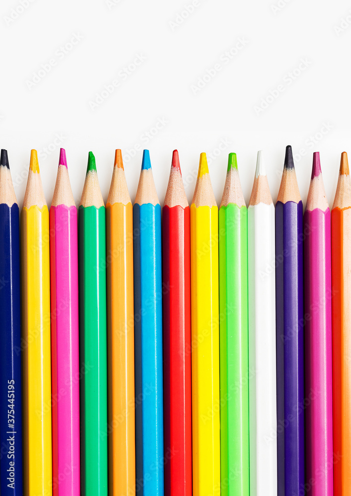 Close up of color pencils on white background. Close up of color pencils on white background.
