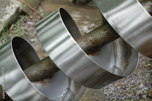 Section of turning archimedes screw transporting water