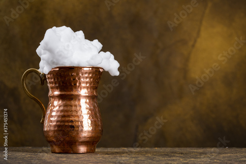 Turkish buttermilk in a copper cup photo