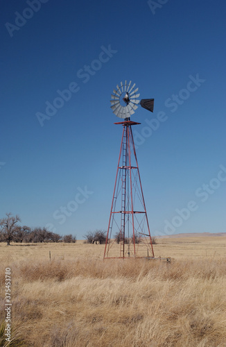 Abandoned homestead and windmill