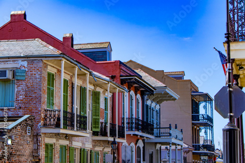 Beautiful Colored Brick and Stucco Homes Line One of the Many Streets in the French Quarter of New Orleans, Louisiana, USA