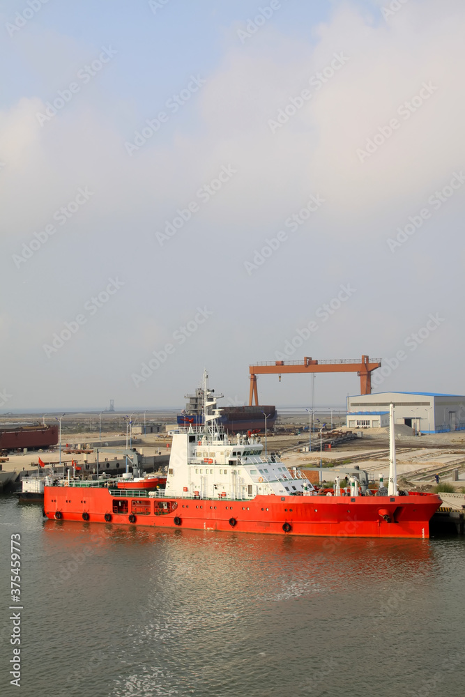 Fototapeta premium ships moored at the pier in a shipyard
