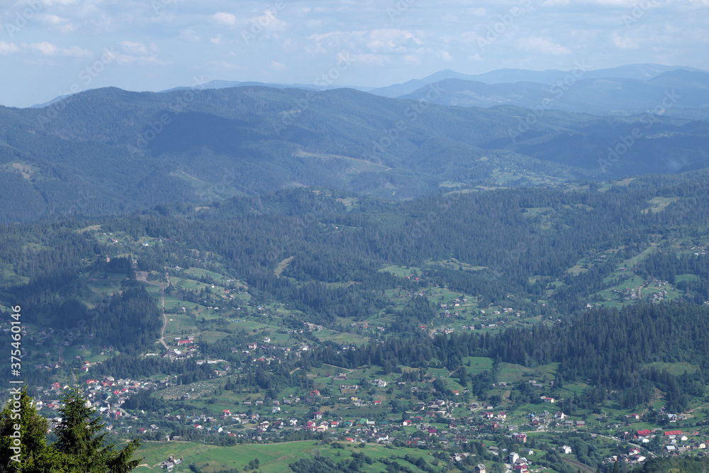 small village in the mountains in summer small village in the mountains in summer