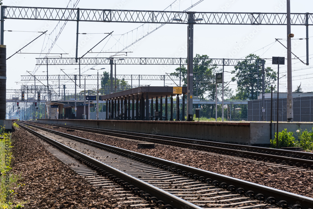 Railway tracks and station in distance view Railway tracks and station in distance view