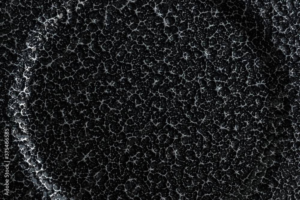 Dark metallic background with grungy texture Dark metallic background with grungy texture