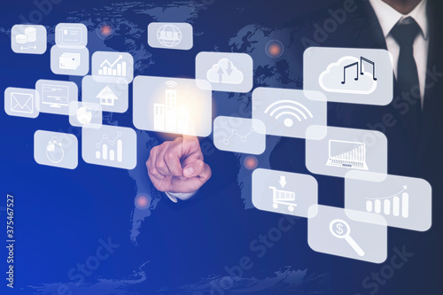 Photo Businessman touchscreen on the graph Screen Icon of a media screen, Technology Process System Business with Communication and marketing concept.