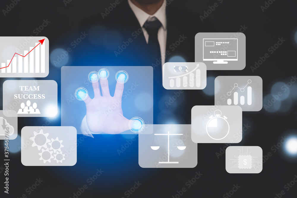 Photo Businessman touchscreen on the graph Screen Icon of a media screen, Technology Process System Business with Communication and marketing concept. Photo Businessman touchscreen on the graph Screen Icon of a media screen, Technology Process System Business with Communication and marketing concept.