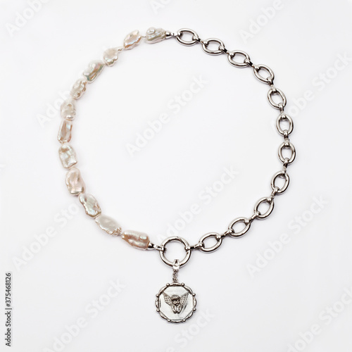 Luxury elegant baroque pearl necklace on white background