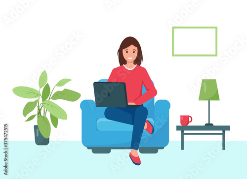 Young woman in armchair working or learning