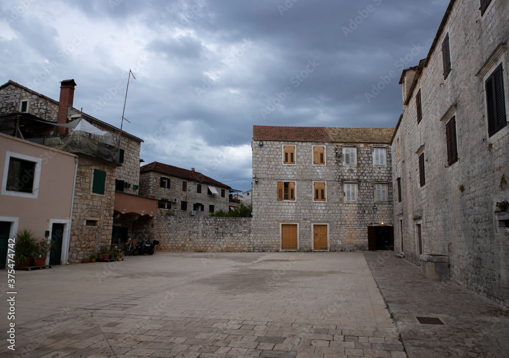 Stari Grad/Croatia-August 7th,2020: Empty street in the oldest town on Hvar island just minutes before summer storm strikes with heavy rain