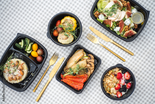 Sat of take away boxes with healthy food on the table. Restaurant dishes. Flat lay