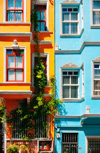 Bright blue and bright orange houses close up on the streets of Istanbul. Balat district.