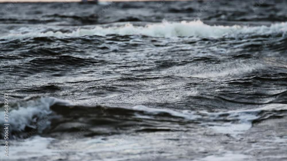 beautiful blue sea with waves in the evening. Close-up of waves with foam. beautiful blue sea with waves in the evening. Close-up of waves with foam.