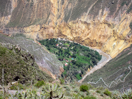 Sangalle Oasis Surrounded by Green Mountains and the River in Arequipa / Peru photo