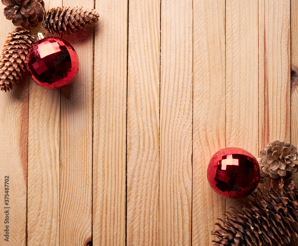christmas decoration over wooden desk backdrop. festive ornament frame. copy space. above view christmas decoration over wooden desk backdrop. festive ornament frame. copy space. above view