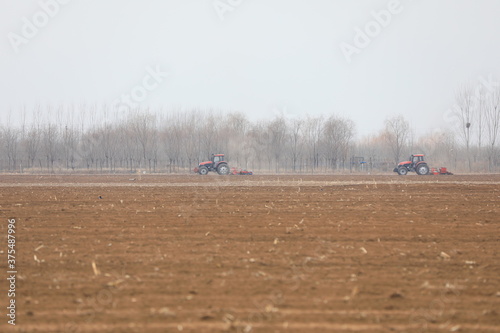 seeder sows in the field, North China
