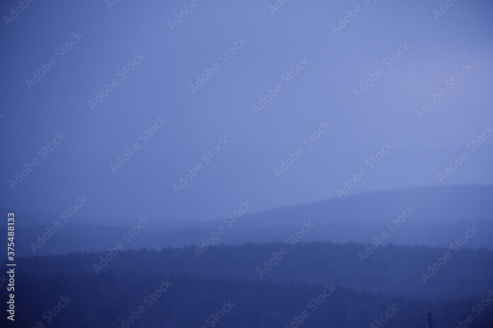blue mountain horizon landscape trees dusk mist