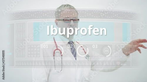 Doctor scrolls to INSULIN GLARGINE generic drug name on a touchscreen display photo