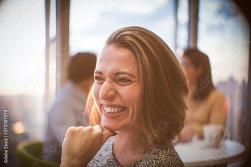 Close up laughing businesswoman photo