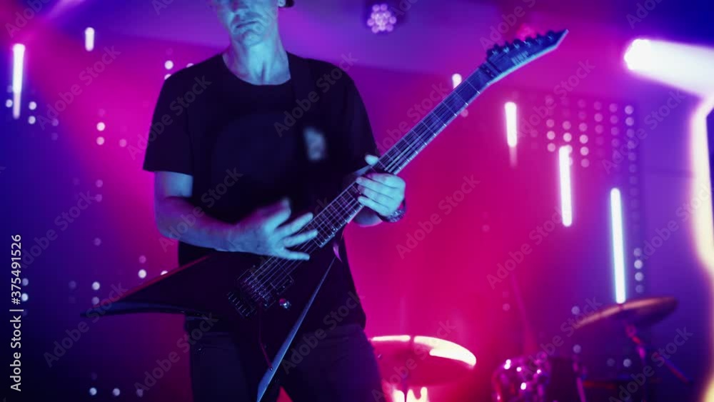 Four Man Rock Band With Lead Singer Guitarists Bassist And Drummer four-man-rock-band-with-lead-singer-guitarists-bassist-and-drummer