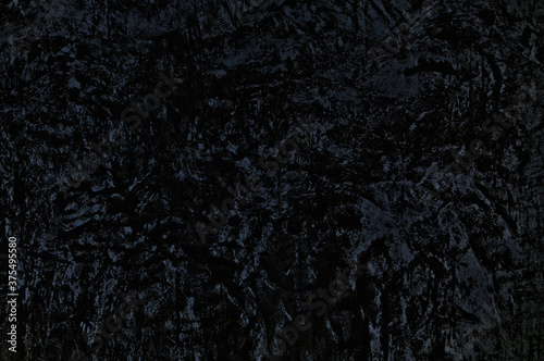 Abstract grunge texture on black wall for background.