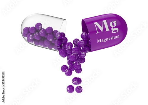 Open capsule with magnesium from which the vitamin composition is pouring