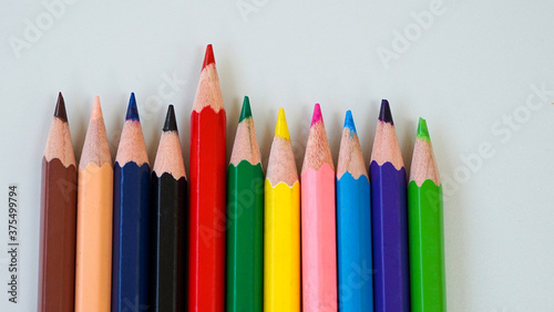 colored pencils on white background