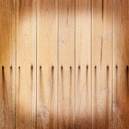 wooden wall with stain rust from old screws texture background photo