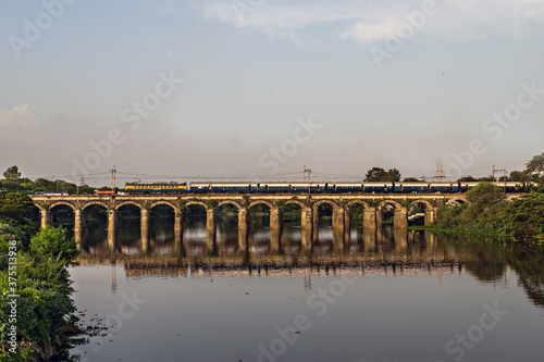 Pune to Mumbai super fast Intercity express train passing over Harris bridge. photo