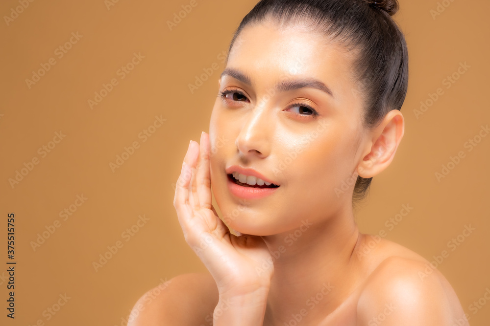Beautiful woman with good skin taking pictures of face with hands, beautiful portrait and spa. Happy smiling face
