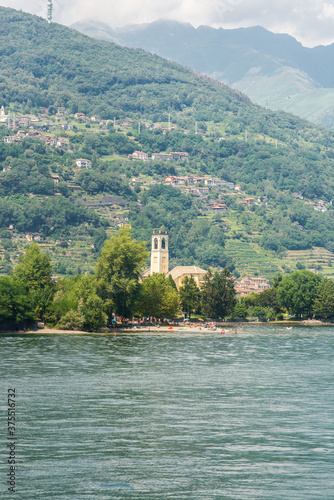 Landscape with Catholic Church Santo Stefano in Dongo on Como Lake.