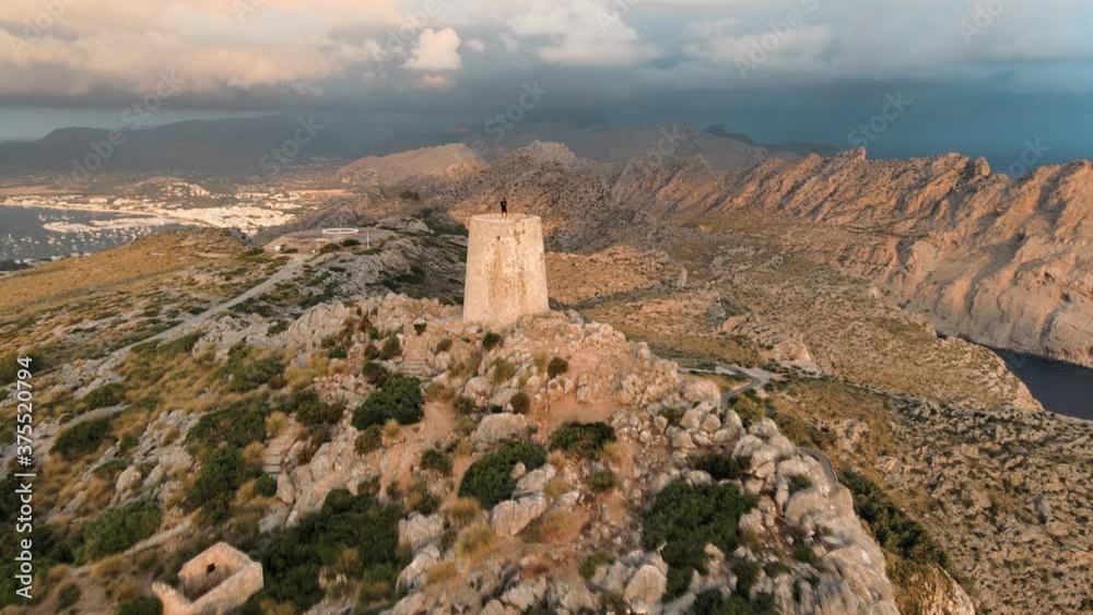 Aerial jib up shot rising over the rugged coastline of Mallorca and the Cape of Formentor at sunset Aerial jib up shot rising over the rugged coastline of Mallorca and the Cape of Formentor at sunset