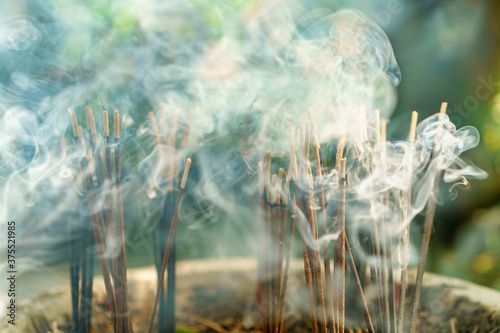 burning aromatic incense sticks. Incense for praying hindu and buddha photo