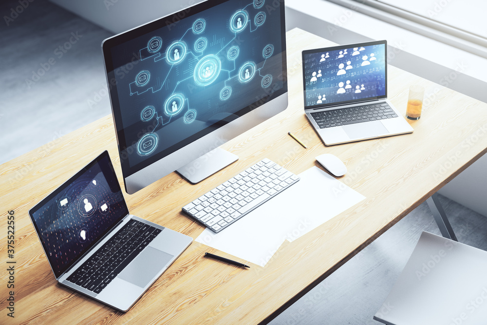 Modern computer monitor with social network icons concept. Marketing and promotion concept. 3D Rendering Modern computer monitor with social network icons concept. Marketing and promotion concept. 3D Rendering