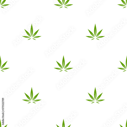 Seamless ornament with green hemp or cannabis leaf on white background.