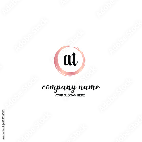 AT Initial handwriting logo template vector 