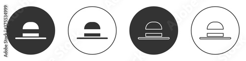 Black Elegant women hat icon isolated on white background. Circle button. Vector.
