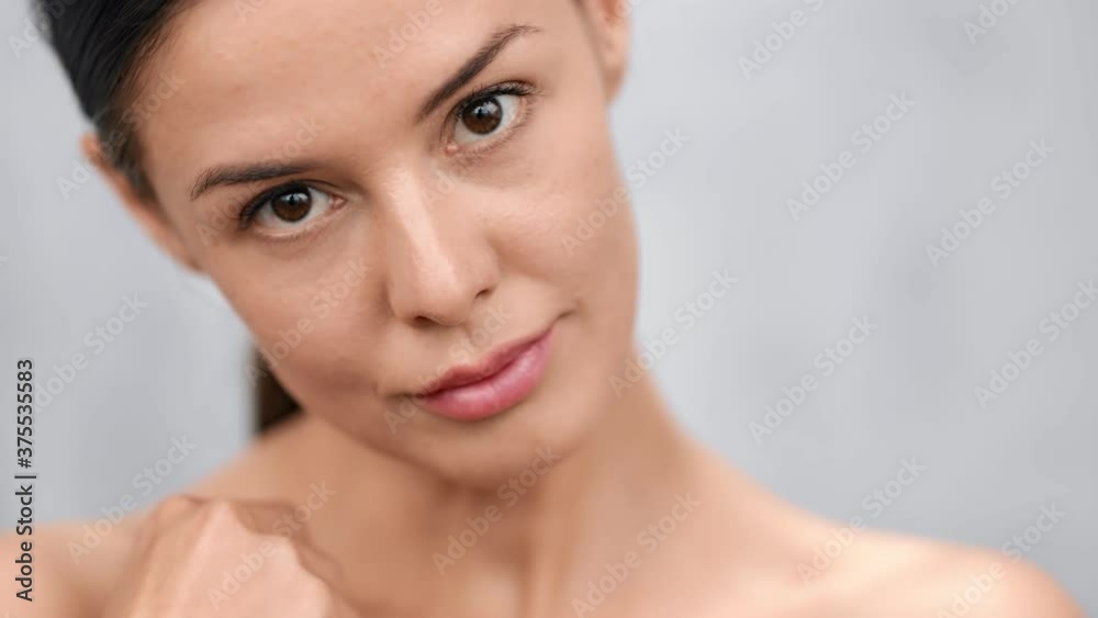 Seductive female posing stroking fresh skin enjoying moisturizing. Close up shot on 4k RED camera Seductive female posing stroking fresh skin enjoying moisturizing. Close up shot on 4k RED camera