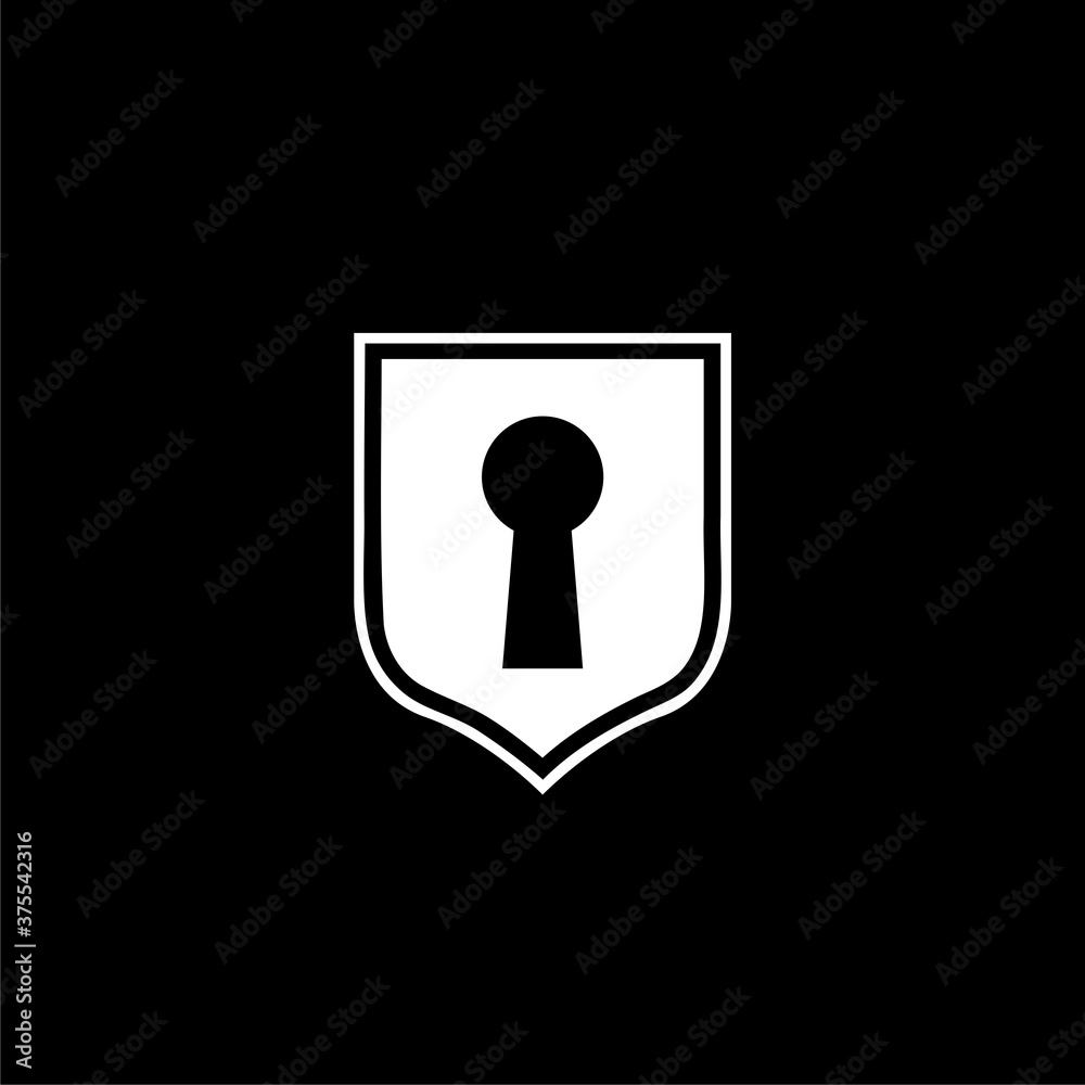 Shield with keyhole icon isolated on dark background Shield with keyhole icon isolated on dark background