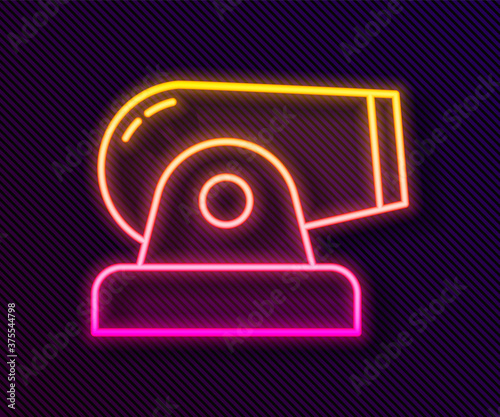 Glowing neon line Cannon icon isolated on black background. Vector.