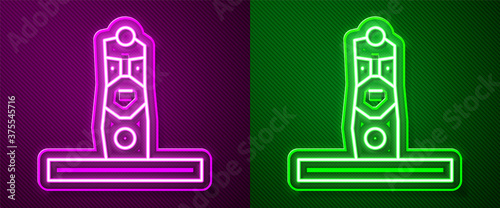 Glowing neon line Slavic pagan idol icon isolated on purple and green background. Antique ritual wooden idol. Vector.