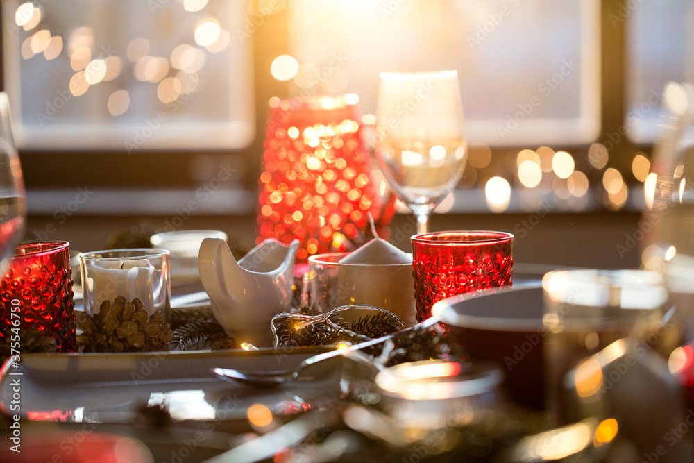 christmas, holidays and eating concept - table served for festive dinner at home - obrazy, fototapety, plakaty 